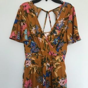 Yellow floral jumpsuit with pockets